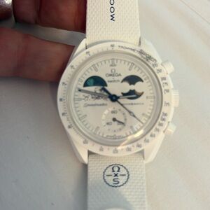 Swatch omega mission to earthphase moonshine gold